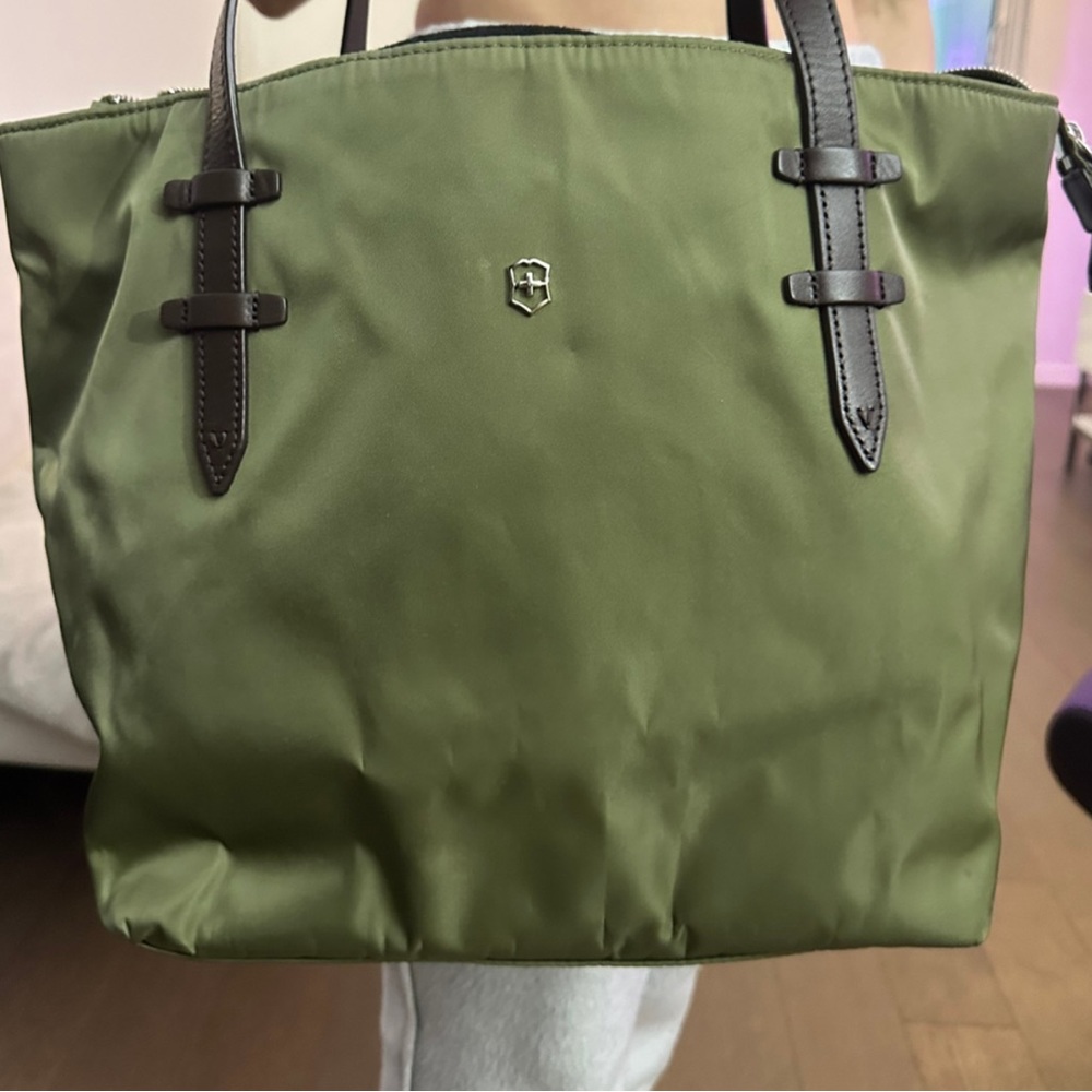 New bag , Brand VictoriNox , size medium, colour green
